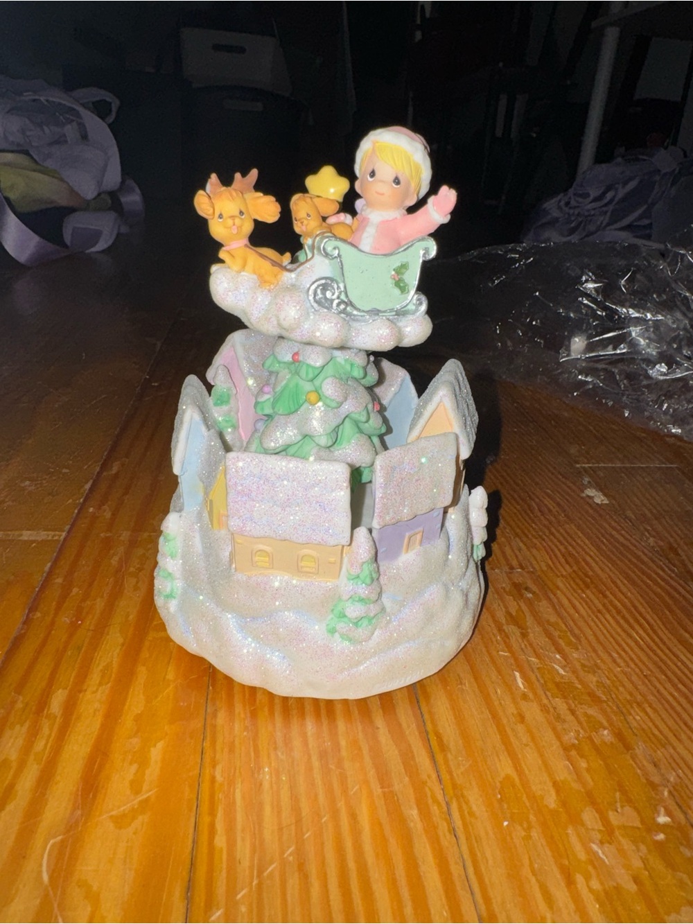 Enesco Pastel Holiday Village Figurine with Child in Sleigh